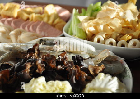 Assortment of food tofu, vegetables and meat for chinese hotpot Stock Photo