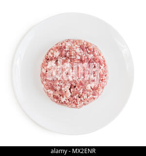 Raw red meat burger for hamburgers of minced ground beef or pork in plate ready for cooking. Isolated on white background. Top view. Stock Photo