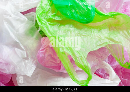 Colorful plastic bag on cement floor background. Stock Photo