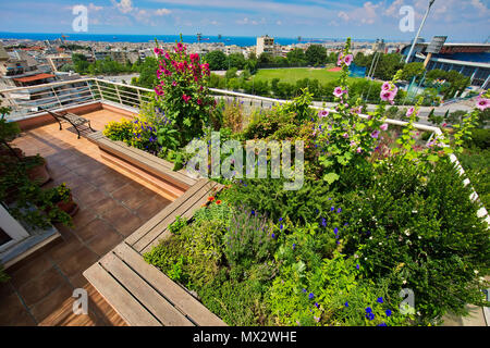 Beautiful modern terrace with a lot of flowers in Thessaloniki, Greece Stock Photo