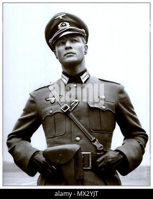 Vintage B&W film still image of Marlon Brando in Nazi military uniform starring in The Young Lions a 1958 Twentieth Century Fox movie film directed by Edward Dmytryk American-Canadian film director Stock Photo