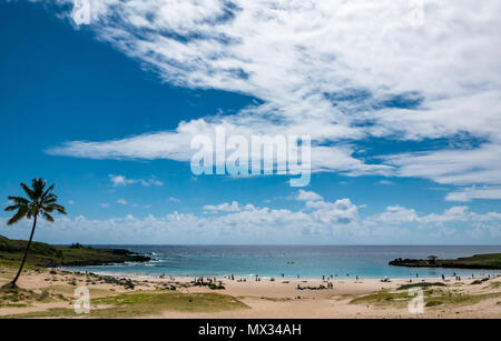 People on Anakena sandy curved bay beach, Easter Island, Rapa Nui, Chile Stock Photo