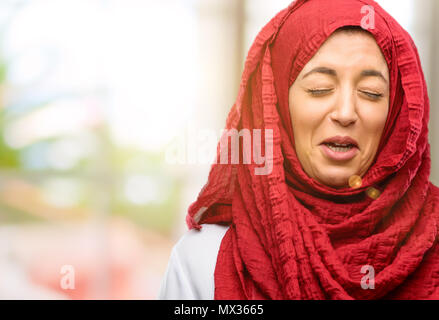 Muslim woman with hijab crying Stock Photo - Alamy