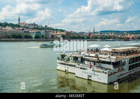 Passenger boats moored on the River Danube in Budapest, Hungary. Stock Photo