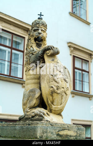 Lions statue near Swiss Gate (Schweizertor) (15th c.) of Hofburg, Vienna, Austria Stock Photo