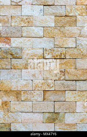 Decorative stone for decoration of the fireplace. Background. Stock Photo