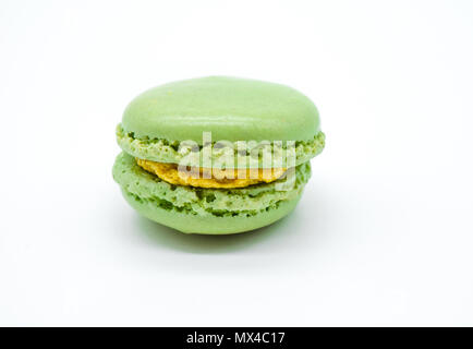 green macaron isolated on white background, one macaron Stock Photo