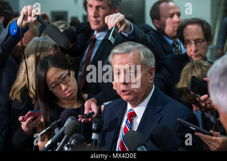 Senator Lindsey Graham (R-SC) speaks with reporters in the U.S. Capitol subway after a closed senate briefing by Deputy Attorney General Rod Rosenstein. Stock Photo