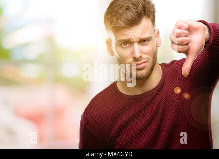 dislike gesture disapproval sign man thumb down Stock Photo - Alamy