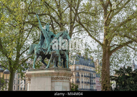 The bronze statue of Charlemagne and his Guards is located in the plaza near Notre Dame Cathedral in Paris France. Stock Photo