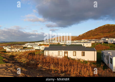 Gower, Wales, UK: December 15, 2017: Static caravan holiday homes at Hillend Caravan Park, Llangennith on the Gower Peninsular in winter. Stock Photo