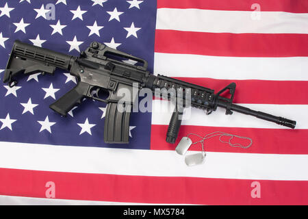 M4 RIS assault carbine on us flag Stock Photo