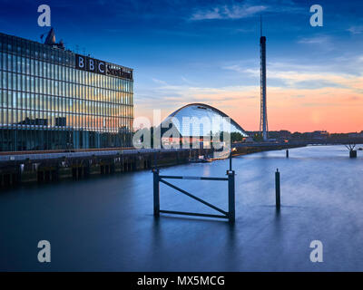 Sunset over the river Clyde with a view on the BBC Scotland headquarters building, Science Center and Glasgow Tower, Scotland Stock Photo