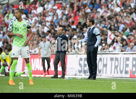 London, UK. 2nd June, 2018. England's manager Gareth Southgate (1st R) instructs during the International Friendly Football match between England and Nigeria at Wembley Stadium in London, Britain on June 2, 2018. England won 2-1. Credit: Han Yan/Xinhua/Alamy Live News Stock Photo