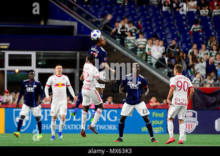 Foxborough Massachusetts, USA. 2nd June, 2018. New England Revolution forward Juan Agudelo (17) heads the ball during the MLS game between New York Red Bulls and the New England Revolution held at Gillette Stadium in Foxborough Massachusetts. The Revolution defeat the Red Bulls 2-1. Eric Canha/CSM/Alamy Live News Stock Photo