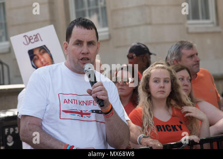 Downing Street, London, UK. 3rd Jun, 2018. Protesters come from all over England lay shoes outside Downing Street to represent lives lost to knife crime demand justice and tough sentences in the UK, 3 June 2018, London, UK Credit: See Li/Alamy Live News Stock Photo