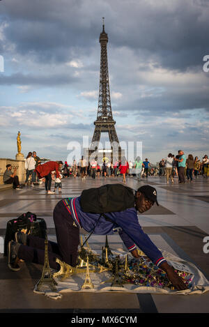 The souvenir seller prepares his stand under the Eiffel Tower in Paris, France on 02.06.2018 by Wiktor Dabkowski | usage worldwide Stock Photo