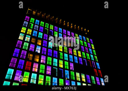 Colored windows texture. Windows illuminated by neon lights background ...