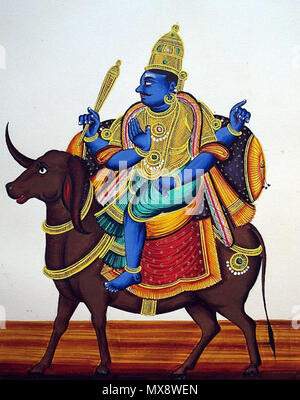 . English: Gouache painting on paper from an album of eighty-two paintings of Hindu deities. Four-armed and dark-complexioned Yama rides on his bejewelled and caparisoned buffalo. In his upper right hand is the danda (staff). His upper left is in suchi mudra, his lower right is in abhaya mudra, and his lower left is by his waist. circa 1850. Company School 214 Four-armed and dark-complexioned Yama rides on his bejewelled and caparisoned buffalo. In his upper right hand is the danda (staff) (cropped) Stock Photo