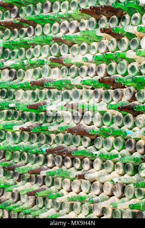 Wall made of empty green and brown bottles Stock Photo