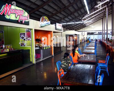 PASIG CITY, PHILIPPINES - MAY 27, 2018: Food stalls at the Food Village of the Tiendesitas shopping complex in Pasig City, Philippines. Stock Photo