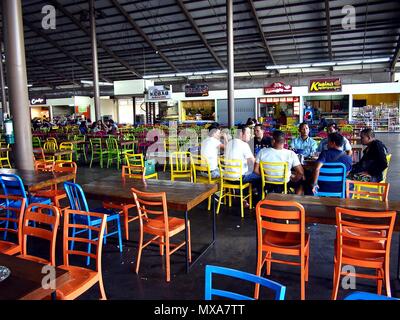 PASIG CITY, PHILIPPINES - MAY 27, 2018: Food stalls at the Food Village of the Tiendesitas shopping complex in Pasig City, Philippines. Stock Photo