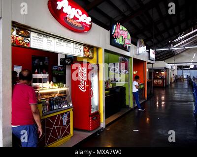 PASIG CITY, PHILIPPINES - MAY 27, 2018: Food stalls at the Food Village of the Tiendesitas shopping complex in Pasig City, Philippines. Stock Photo