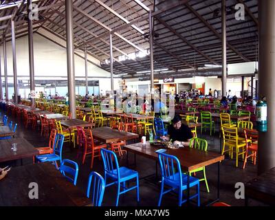 PASIG CITY, PHILIPPINES - MAY 27, 2018: Food stalls at the Food Village of the Tiendesitas shopping complex in Pasig City, Philippines. Stock Photo