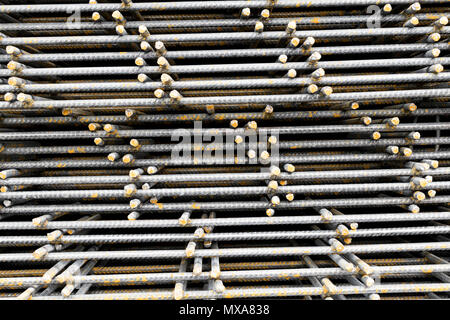 Close-up of a stack of hot-rolled round steel reinforcing bars (Rebars) laid flat Stock Photo