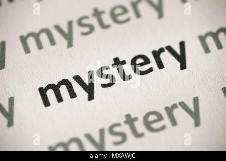 word nystery printed on white paper macro Stock Photo