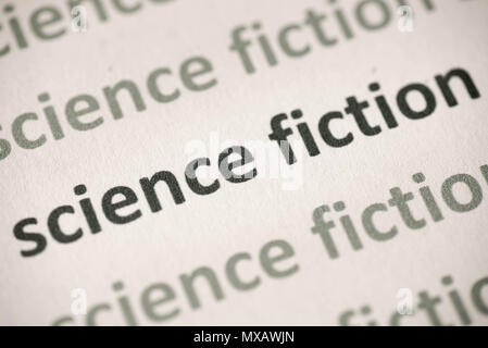words science fiction printed on white paper macro Stock Photo