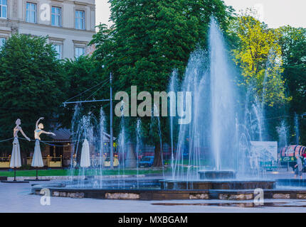 LVIV, UKRAINE - MAY 25, 2018: fountain and female sculptures in city center early morning in Lviv, Ukraine Stock Photo