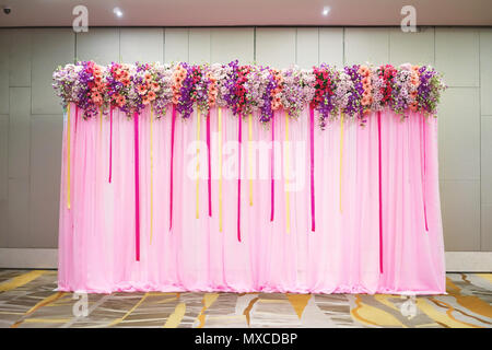 The beautiful backdrop with pink fabric decoration with various