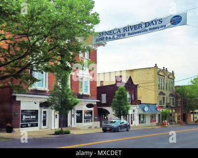 Baldwinsville, New York, USA. May 28, 2018. Downtown Baldwinsville, NY , early morning, with banners advertising The Seneca River Days, an annual fest Stock Photo