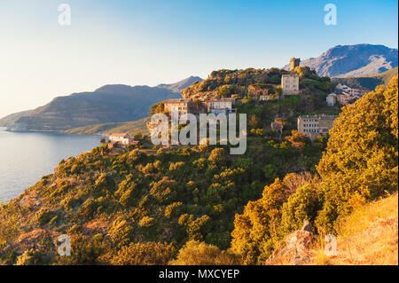 Village of Nonza, Corsica, France at sunset Stock Photo