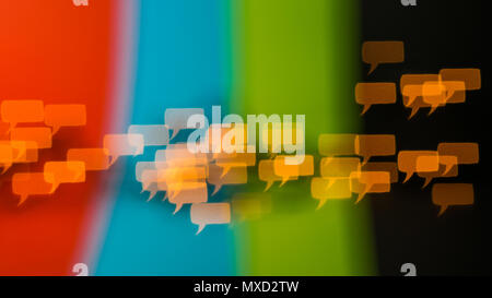 beautiful bokeh made of blurred lights in the form of dialogue bubbles on  multicolored background Stock Photo
