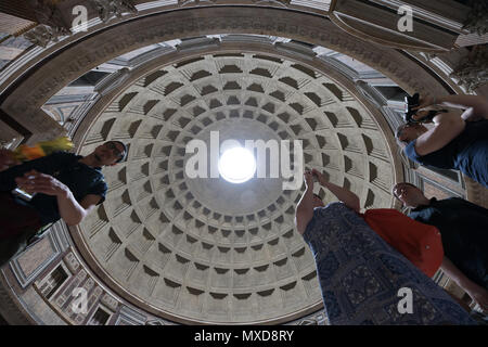 Rome Pantheon interior, light true the hole, tourists visiting Stock Photo