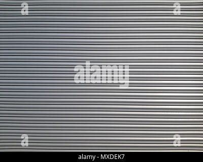 Old metal blinds painted with thick layer of light paint as background Aluminum blinds background. Stock Photo