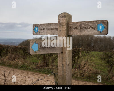 A sign points to the South Downs Way national trail in England's South Downs National Park on 10 February 2018. Stock Photo