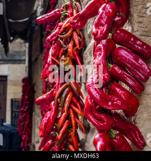 Peppers drying in the sunshine in Laguardia, Spain Stock Photo
