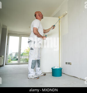 Craftsman renovating an apartment Stock Photo