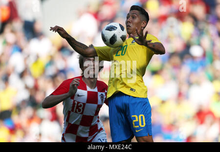 Brazil's Roberto Firmino (right) and Croatia's Tin Jedvaj battle for the ball during the International Friendly match at Anfield, Liverpool. Stock Photo