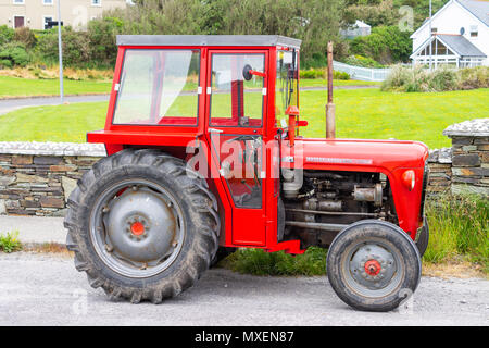 massey ferguson 35x tractor in bright red paintwork. Stock Photo