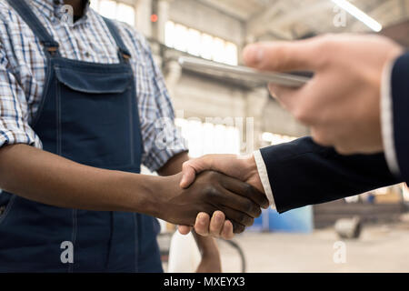 Greeting Investor at Production Department Stock Photo