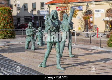 WIELICZKA, POLAND - OCTOBER 26, 2015: Sculpture miners coming out of the underground Wieliczka Salt Mine. Poland Stock Photo
