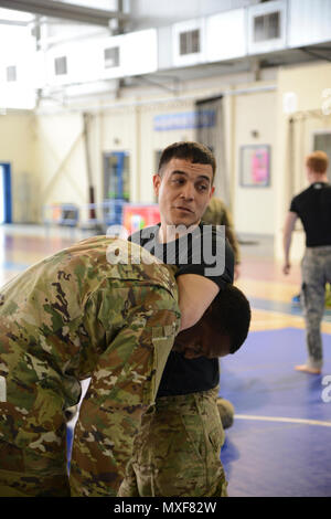 U.S. Army Sgt. Carlos Flores, With 128th Signal Company, Reacts To The ...