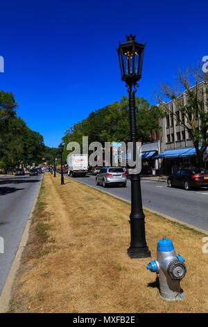 Wellsboro, PA, USA - July 26, 2016: The downtown streets of Wellsboro still illuminated with authentic gas street lamps. Stock Photo