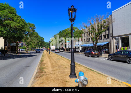 Wellsboro, PA, USA - July 26, 2016: The downtown streets of Wellsboro still illuminated with authentic gas street lamps. Stock Photo