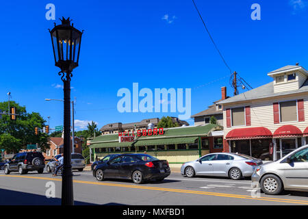 Wellsboro, PA, USA - July 26, 2016: The downtown streets of Wellsboro still illuminated with authentic gas street lamps. Stock Photo