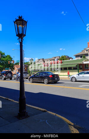 Wellsboro, PA, USA - July 26, 2016: The downtown streets of Wellsboro still illuminated with authentic gas street lamps. Stock Photo